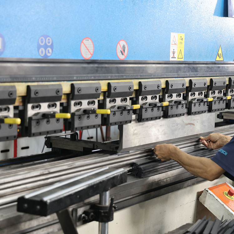 Display racks in production with sample materials prepared for assembly